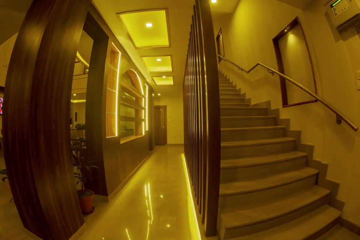 Illuminated staircase with timber panelling